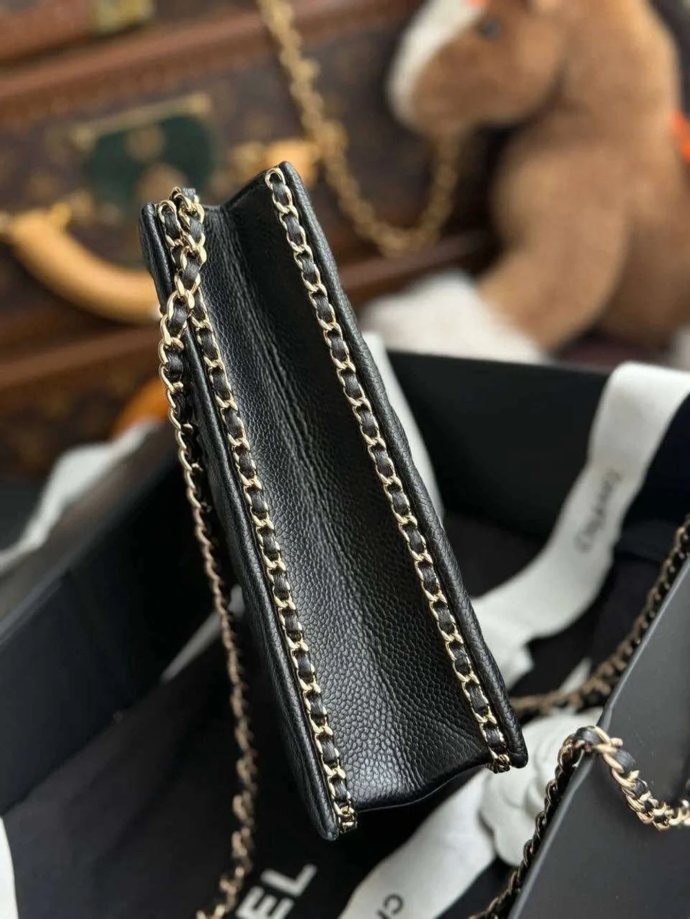 CHANEL Black Quilted Leather Phone Pouch with Gold-Tone CC